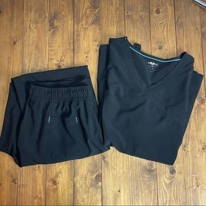 Scrubstar large set of scrubs black with blue stitching